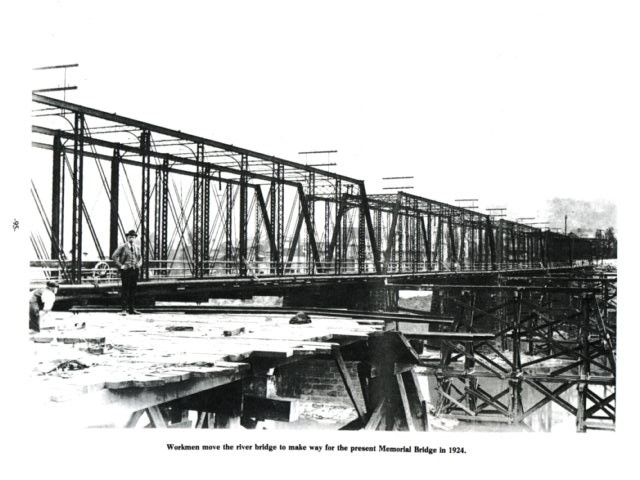 Workmen move the river bridge to make way for the present Memorial Bridge in 1924.