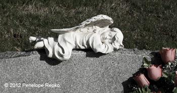 Sleeping angle on tombstone