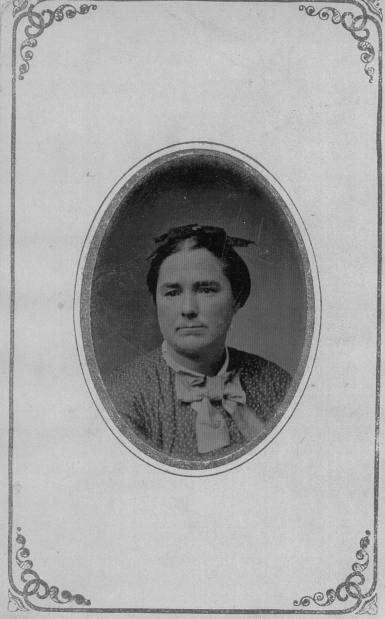 Unknown Middle-aged Lady in print dress